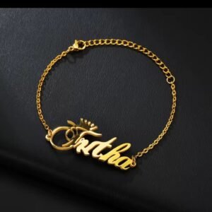 Gold name bracelet with a crown and a script name