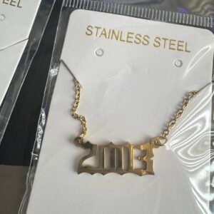 Old English name necklace style with the year 2013 in gold-tone stainless steel